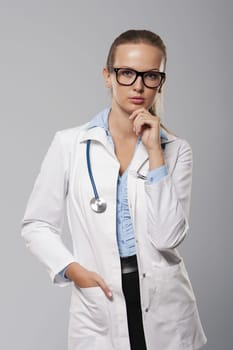 Portrait of serious female doctor