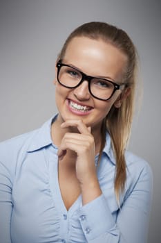 Portrait of beautiful smiling businesswoman with glasses
