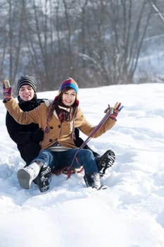 Young couple together in the snow