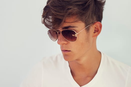 Handsome concentration man wearing glasses