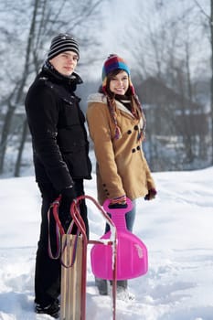 Young couple together in the snow