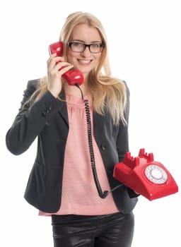 Businesswoman with red phone