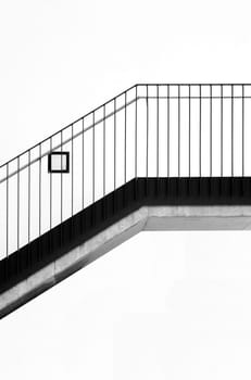 Photographing a modern staircase with a stainless steel railing
