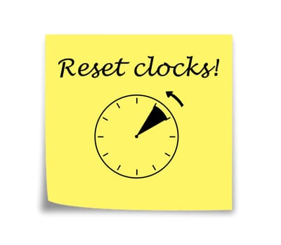 Sticky note reminder to set clocks back, black on yellow
