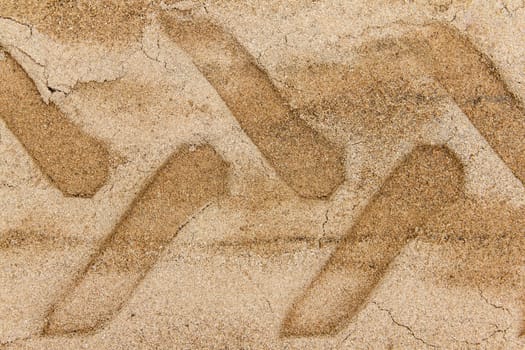 Wheel track on sand ground
