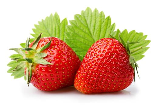 Ripe strawberries with leaves isolated on a white background