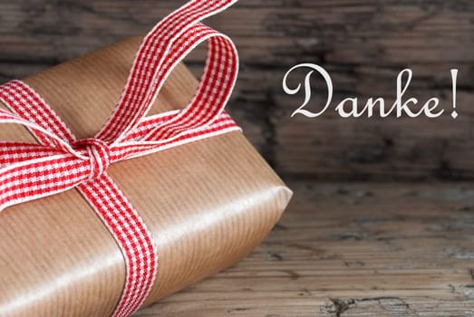Rustic Gift on Wood with the German Word Danke which means Thanks