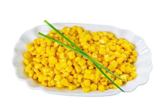 From a high angle,close-up of a small white ceramic bowl full of yellow corn grains. Isolated on white.