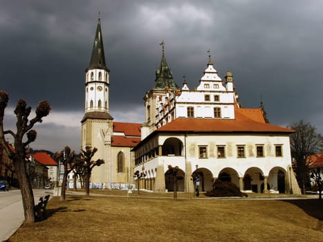 Medieval Town Hall with Church and Bell Tower