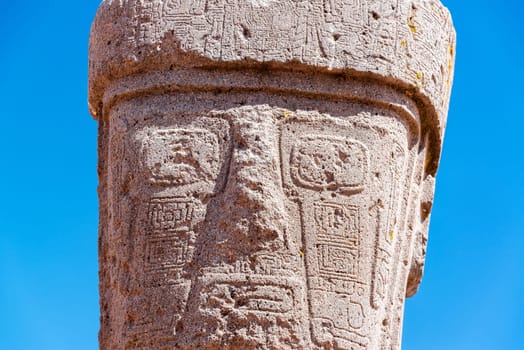 Closeup view of the face of a monolith at the UNESCO World Heritage site of Tiwanaku near La Paz, Bolivia