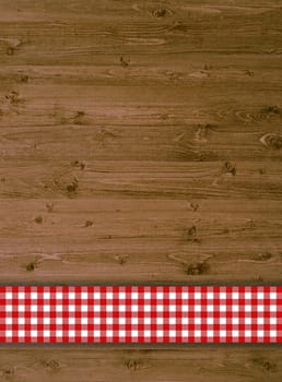 Rustic wooden background with tablecloth stripes red