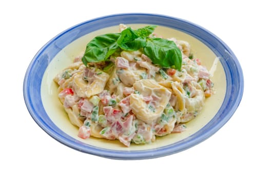Fresh tortellini salad with ham and cream sauce