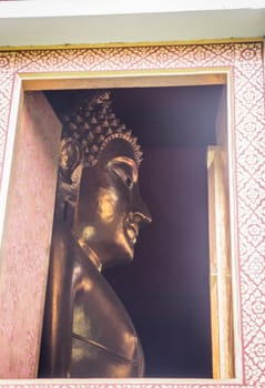 Buddha statue view from window of the temple, stock photo