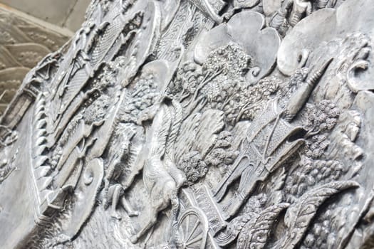 Frame engraving silver lacquer plate in temple is a public place