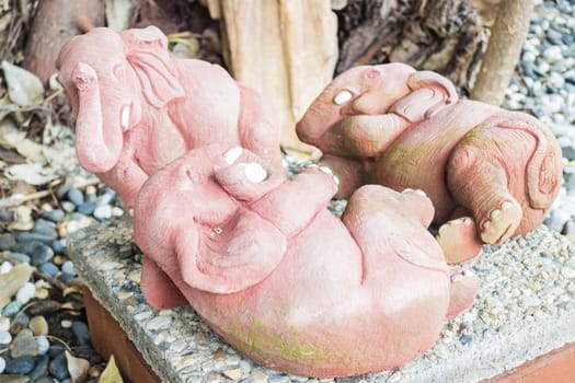 Cute clay sculpture of little three elephants, stock photo