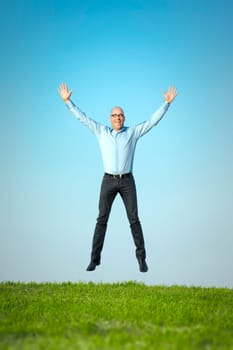 An image of a happy jumping man