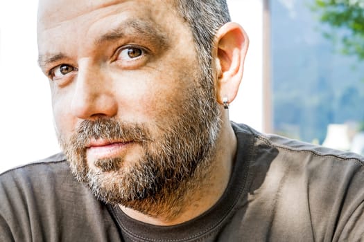 An image of a handsome man with a beard