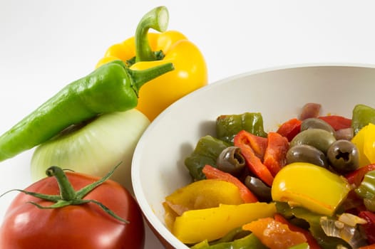 peppers, onions, tomatoes and olives a bit of olive oil and there you have a nice flat