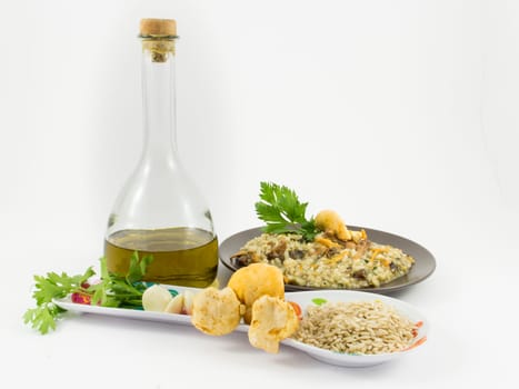 A plate of "risotto"" with mushrooms and its ingredients on white background"
