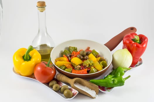peppers, onions, tomatoes and olives a bit of olive oil and there you have a nice flat