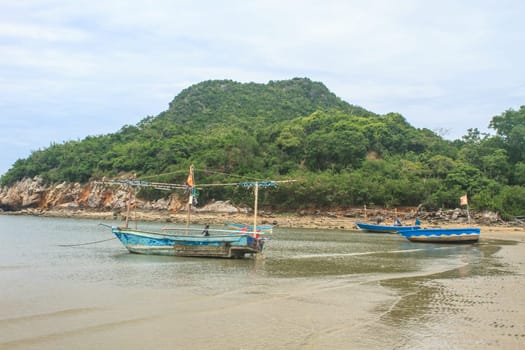 Fishing boat on the beach in summer