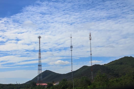 Difference of Telecommunication tower on blue sky