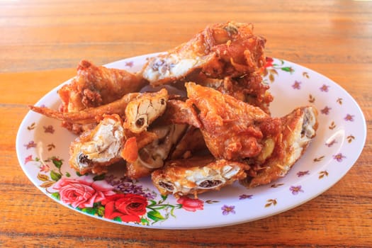 Fresh fried chicken on a plate set, Fresh fried chicken on a wood table