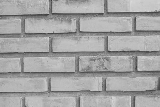 Background of old brick wall texture in monotone