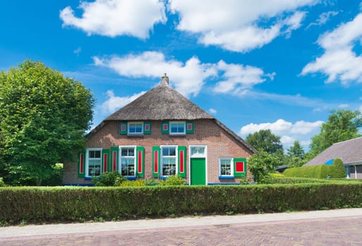 typically dutch farmhouse in staphorst. The community of Staphorst is known as one of the most religious in the Netherlands and has a very closed character