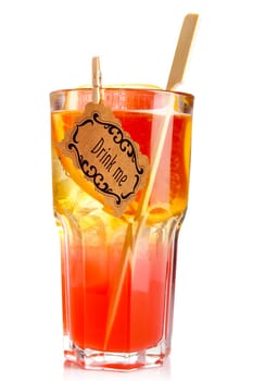Red alcohol cocktail in glass with orange slice isolated on white
