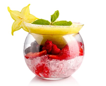 Organic smoothie with exotic fruit and fresh mint in original glass isolated