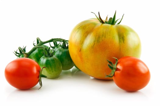 Bunch of Ripe Yellow, Red and Green Tomatoes Isolated on White Background
