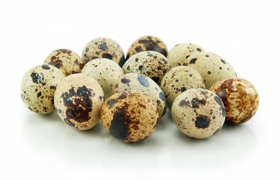 Group of Raw Quail Eggs Isolated on White Background