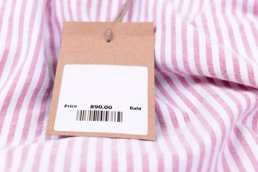 price tag with barcode on a shirt