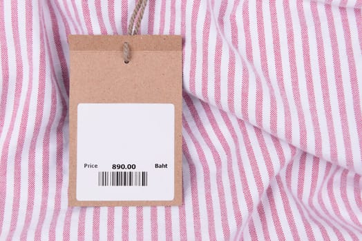 price tag with barcode on a shirt