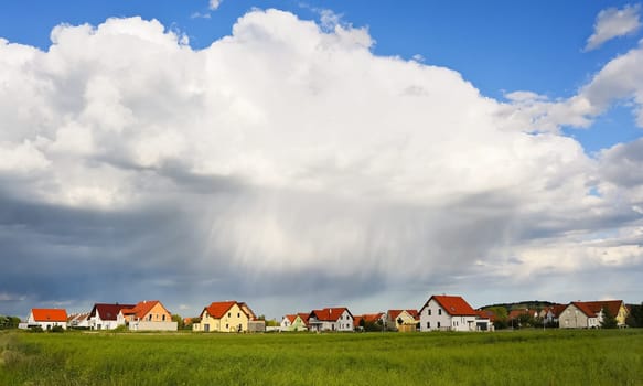 Dense rain clouds over the village