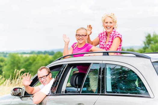 Father goes on holiday by car family or makes excursion