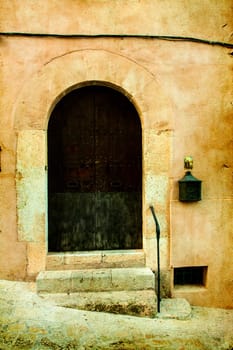 Vintage photo of traditional house in mediterranean village Valldemossa Mallorca, Spain