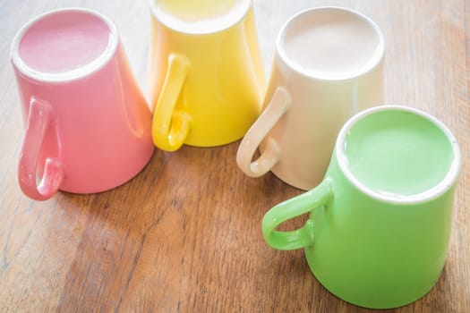 Set of colorful ceramic cups, stock photo