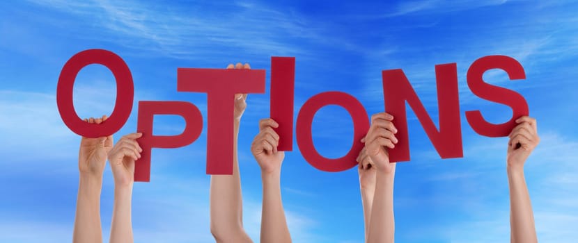 hands holding four pieces of a puzzle with copy space, gray background