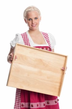 Girl in Dirndl holds tray