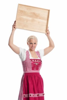 Girl in Dirndl holds tray