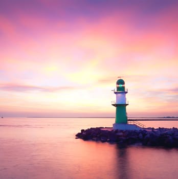 Sunrise at the lighthouse Warnemünde