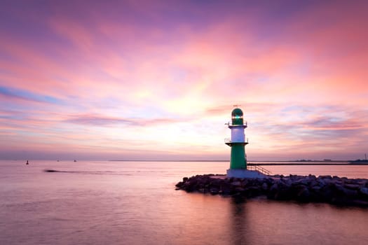 Sunrise at the lighthouse Warnemünde