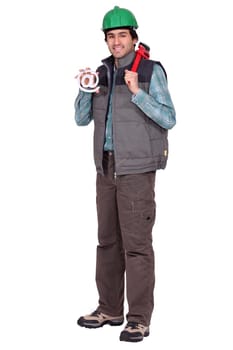 Plumber holding a at sign.