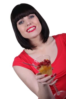 Attractive woman drinking a cocktail