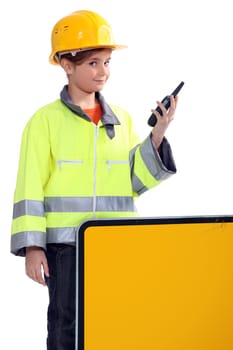 Girl with yellow helmet and radio