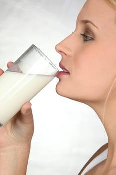Woman drinking water from glass