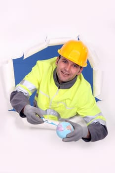 Builder taking planet earths temperature