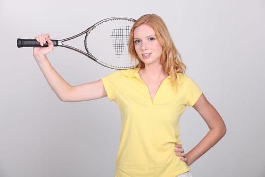 Girl with tennis racket